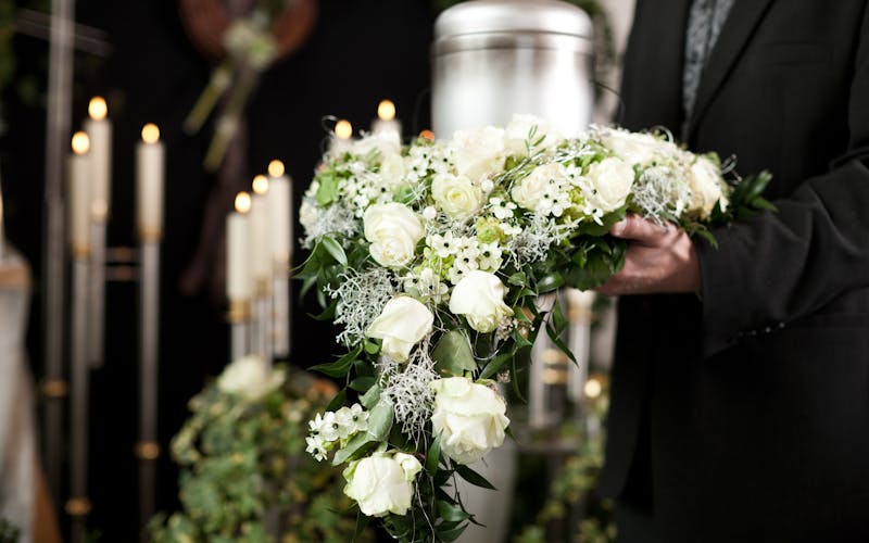Religion, death and dolor - funeral and cemetery; urn funeral